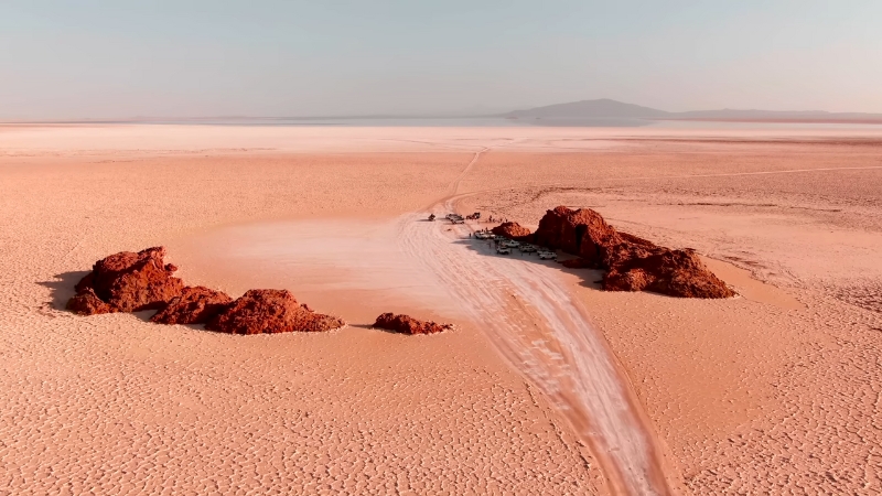 A convoy of vehicles crosses Ethiopia’s vast salt flats, showing why the country stands apart as a non-traditional safari destination